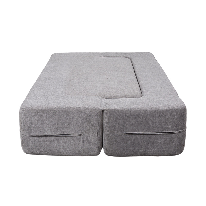 Divano letto trasformabile multifunzionale in velluto grigio chiaro con cuscini