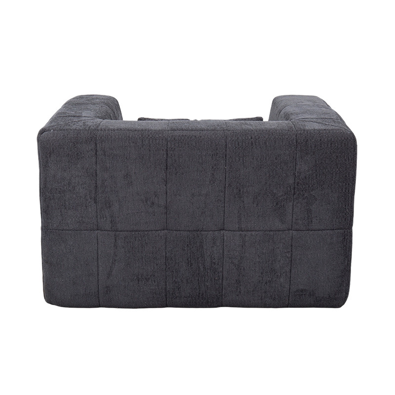 Divano lounge singolo in schiuma integrale con velluto grigio scuro e design a blocchi geometrici Divano lounge singolo in schiuma integrale con velluto grigio scuro e design a blocchi geometrici