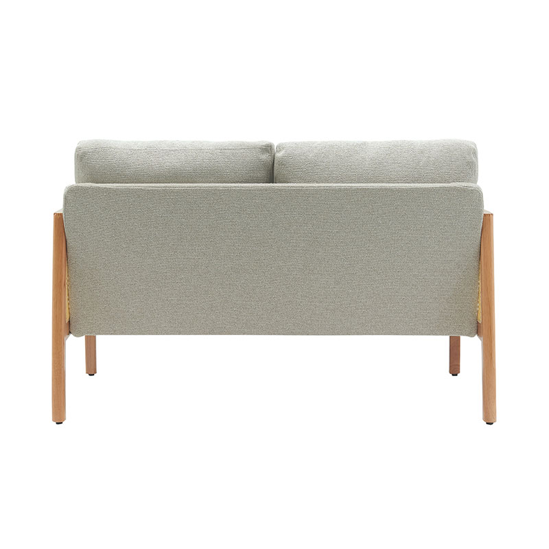 Divano in lino con braccioli in rattan