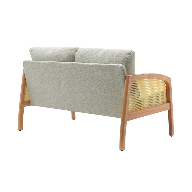 Divano in lino con braccioli in rattan